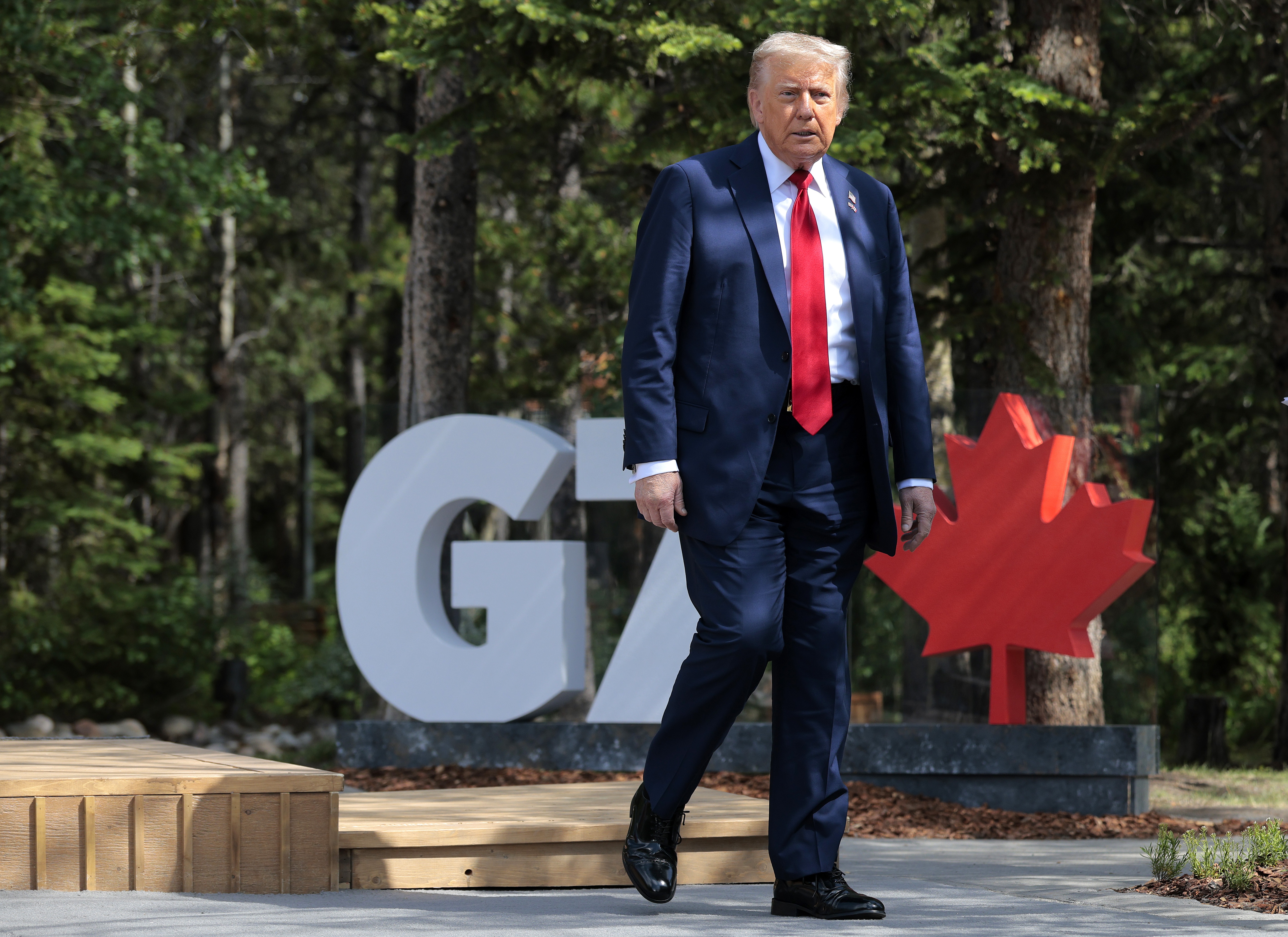 President Trump arrives for the official welcome ceremony during the G7 Leaders