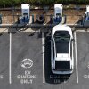 An electric vehicle charges at an EVgo electric charger in Monrovia, Calif.