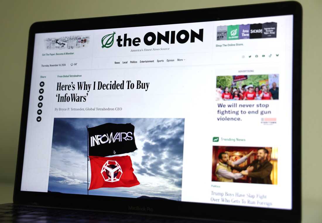 In this photo illustration, The Onion website is displayed on a computer screen, showing a satirical story titled Here’s Why I Decided To Buy ‘InfoWars’, on November 14, 2024 in Pasadena, California.