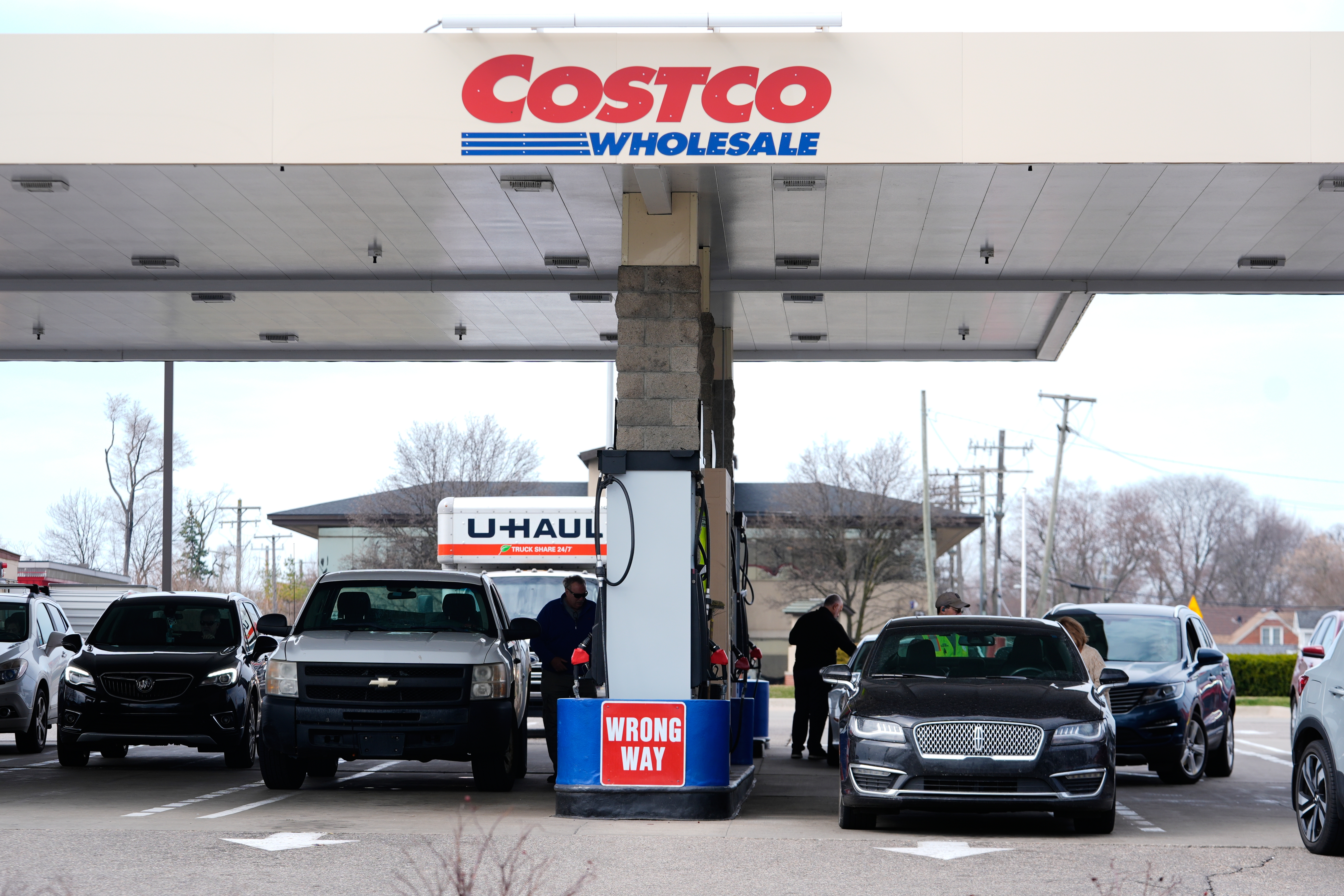 Drivers fuel up at a Costco gas station in Roseville, Mich. (AP)