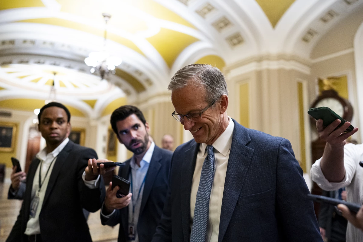 Senate Majority Leader John Thune, R-S.D., walks to the Senate floor during overnight votes at the U.S. Capitol on July 1.