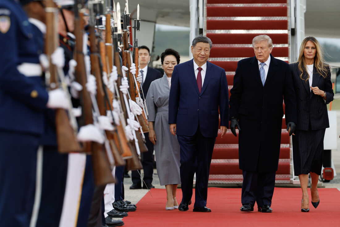 (L-R) First lady of China Peng Liyuan, Chinese President Xi Jinping, U.S. President Donald Trump, and First Lady Melania Trump walk on the red carpet during an arrival ceremony on September 23, 2026, at Joint Base Andrews, Maryland.