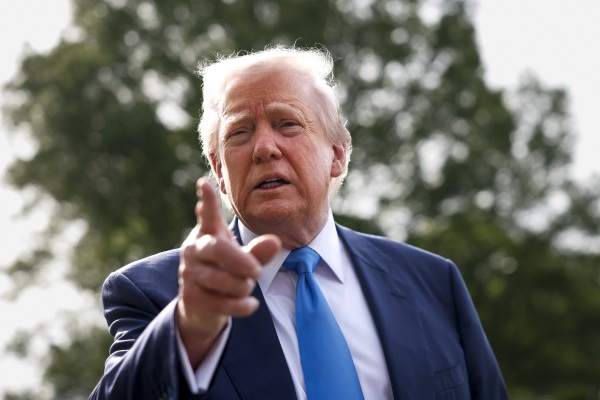 President Trump speaks to the media as he departs the White House on April 25 in Washington, D.C., for Rome to attend the funeral of Pope Francis.