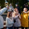A Latvian choir, celebrating their victory in an international competition in Moldova, cheers in support of the European referendum near the Moldovan Parliament on Monday in Chișinău, Moldova.
