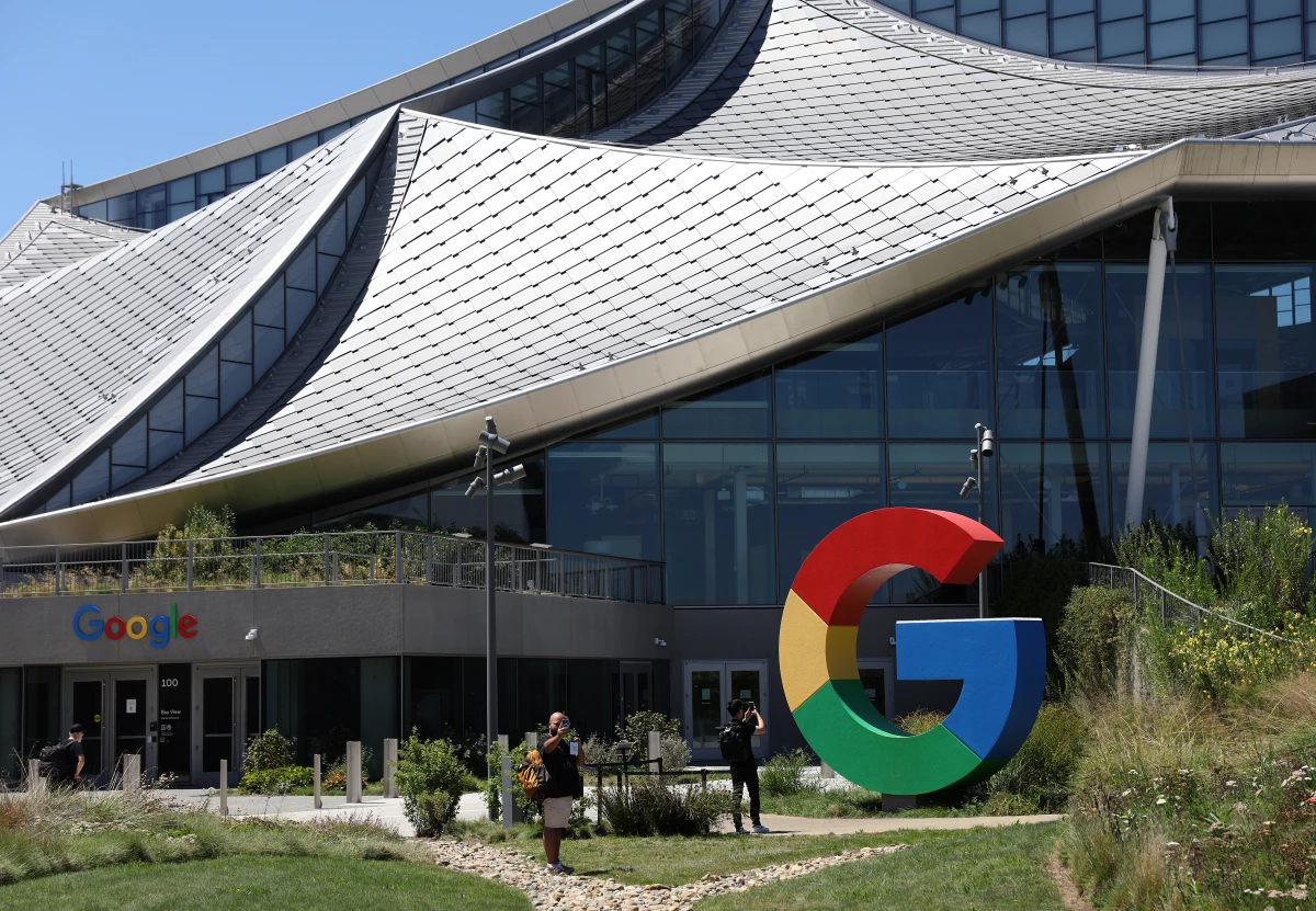 MOUNTAIN VIEW, CALIFORNIA - AUGUST 13: The Google logo is displayed in front of company headquarters during the Made By Google event on August 13, 2024 in Mountain View, California.