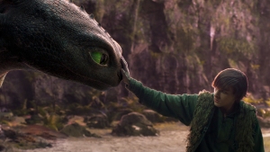 Mason Thamesas Hiccup with his Night Fury dragon, Toothless, in the new live-action How to Train Your Dragon.