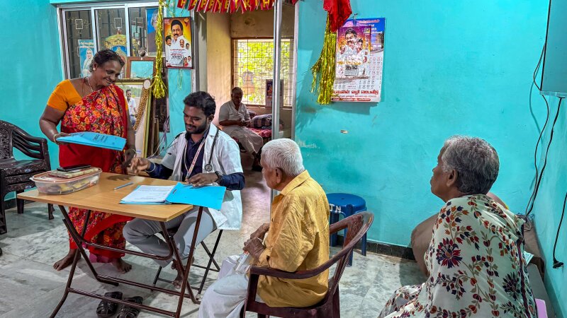 More of doctor visiting with patients