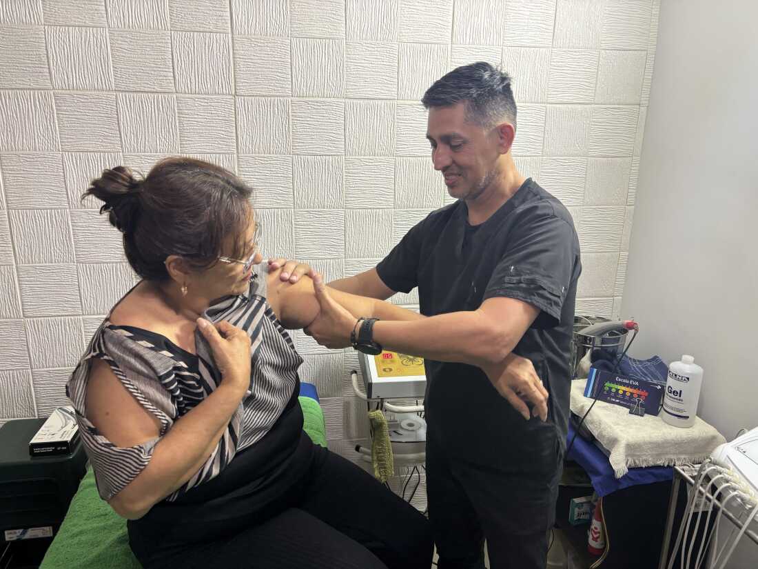 Raul Parra is a full-time teacher. To make ends meet he also works as a physical therapist from a small apartment he rents with a friend.