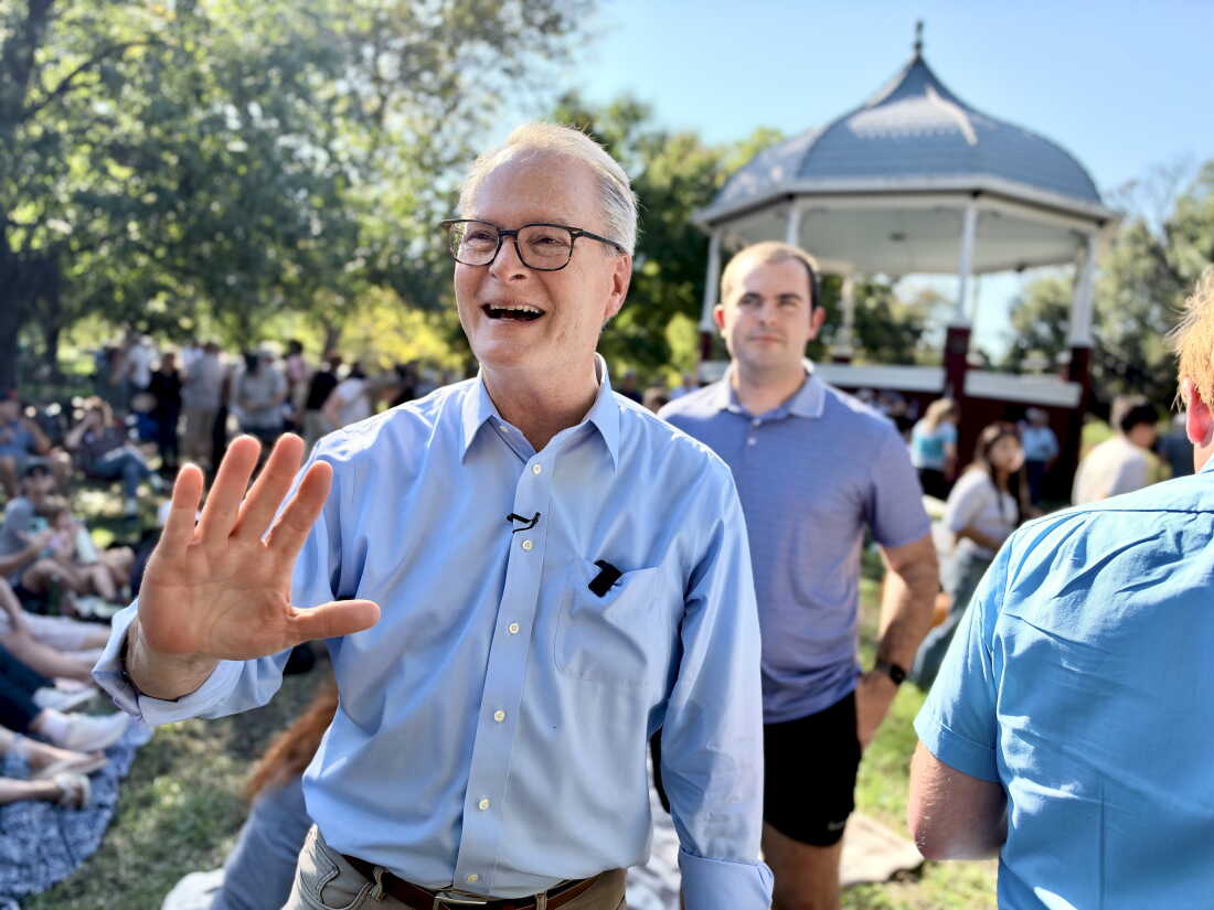 Kansas Democratic Senate nominee Adam Hamilton speaks with voters in Lawrence, Kan. Monday, Oct. 12, 2026.