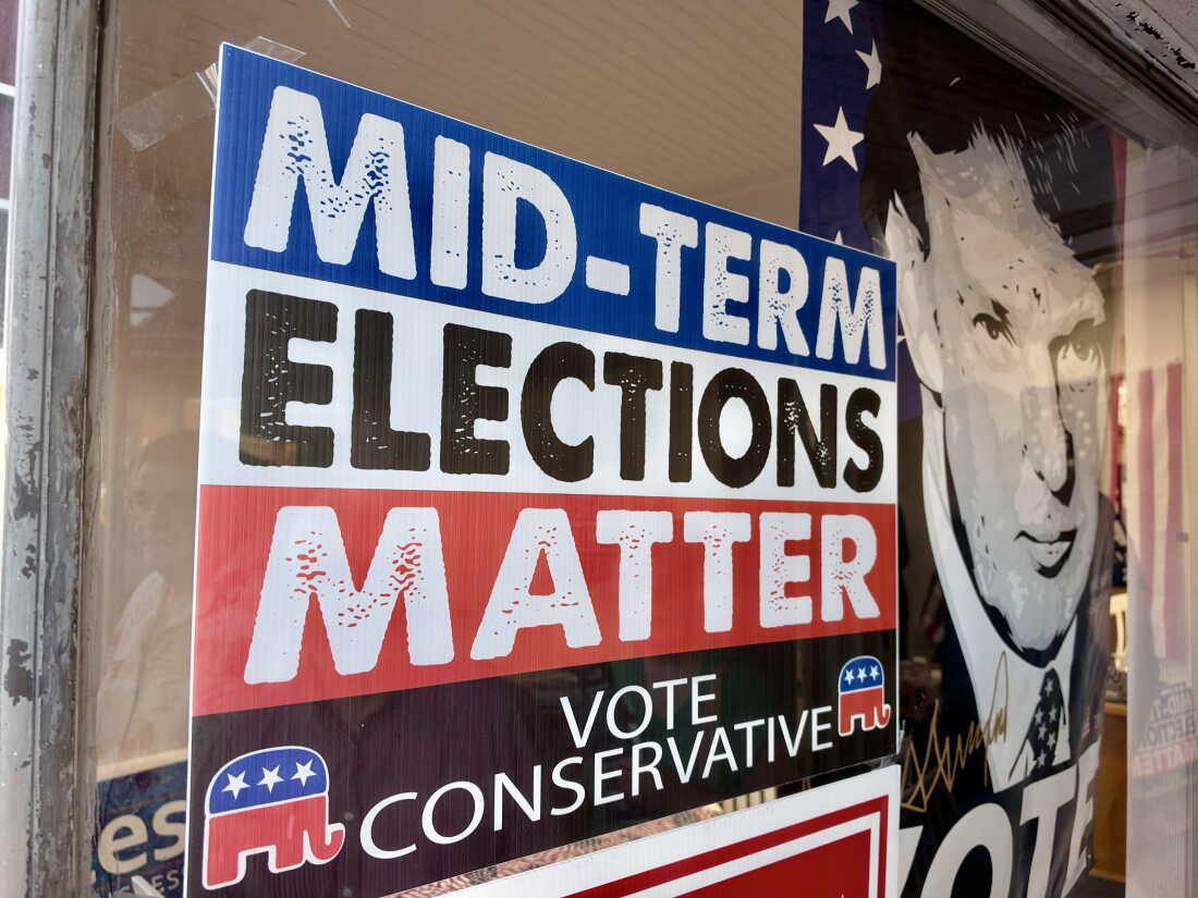Signs reading "Midterm Elections Matter, Vote Conservative" and a photo of President Trump with the word Vote across the bottom seen on a Kansas GOP bus tour across the state to bolster Republican candidates in an unusually competitive year. 