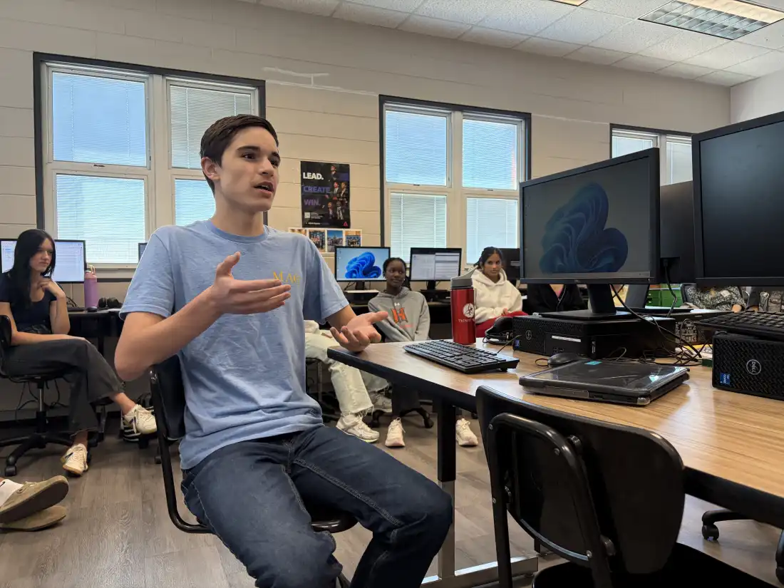 Lucas McKinney takes part in a discussion about the outside factors that affect a business and consumers during his AP Business with Personal Finance class at Hoover High School on October 6, 2026.