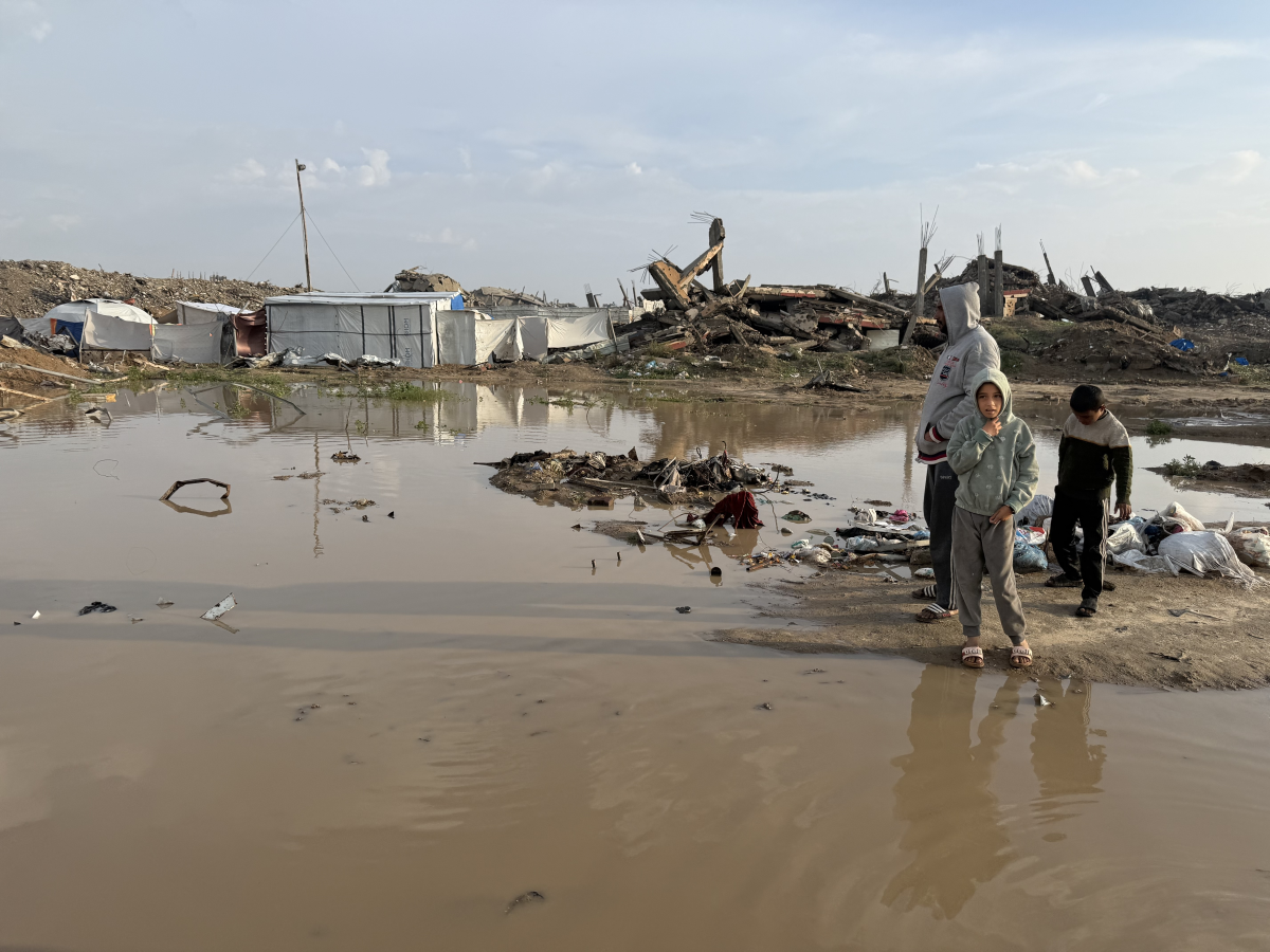 Dirty water pools near the tents of displaced families after a storm made landfall in Gaza City, flooding tents and destroying thousands of makeshift shelters on Dec. 11.