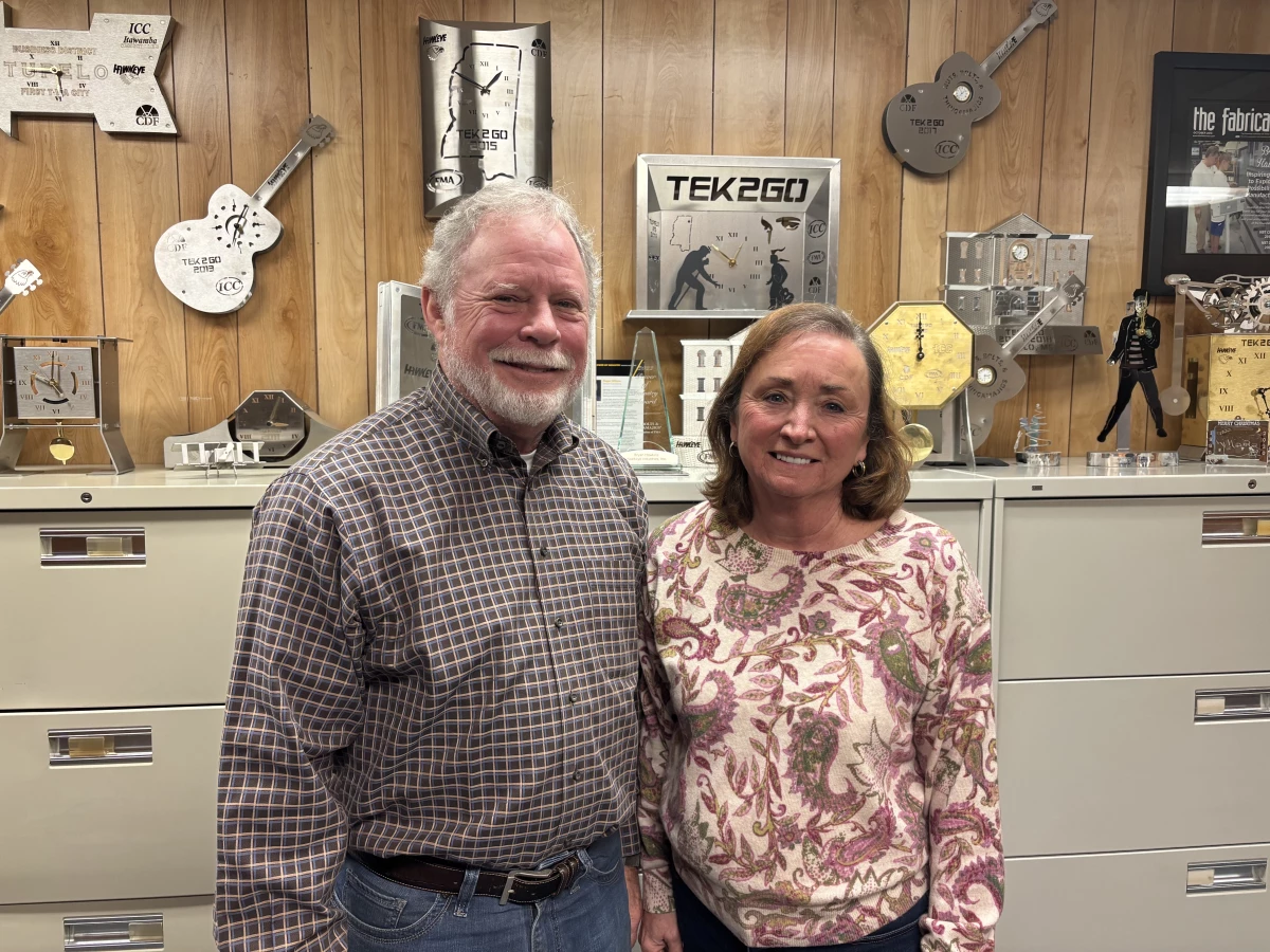 'We're as busy as I've ever been,' says Bryan Hawkins (L), CEO of Hawkeye Industries, which has been making custom sheet metal parts in Tupelo for 30 years. His wife, Brenda (R), and three sons are part of the operation.