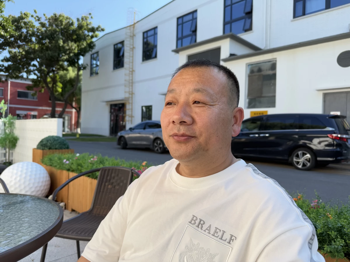 Yang Guangdong, 47, has been in the ride-hailing business for a decade. He says riders' complaints about the smell in cars are often unfair and subjective.
