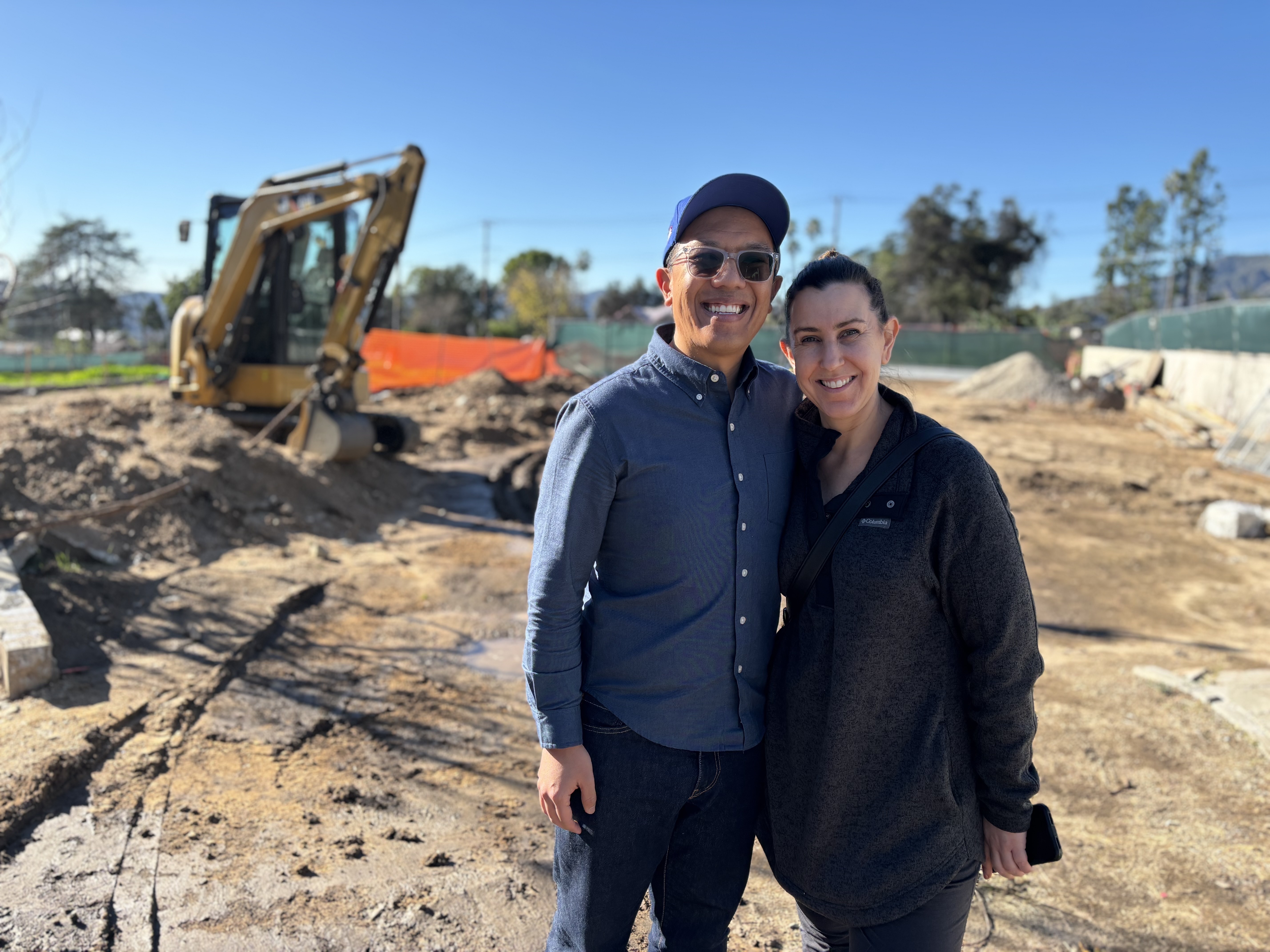 Andrew and Kelly King have a permit but still aren't sure whether they'll be able to afford to rebuild their home that was destroyed in the Eaton Fire.