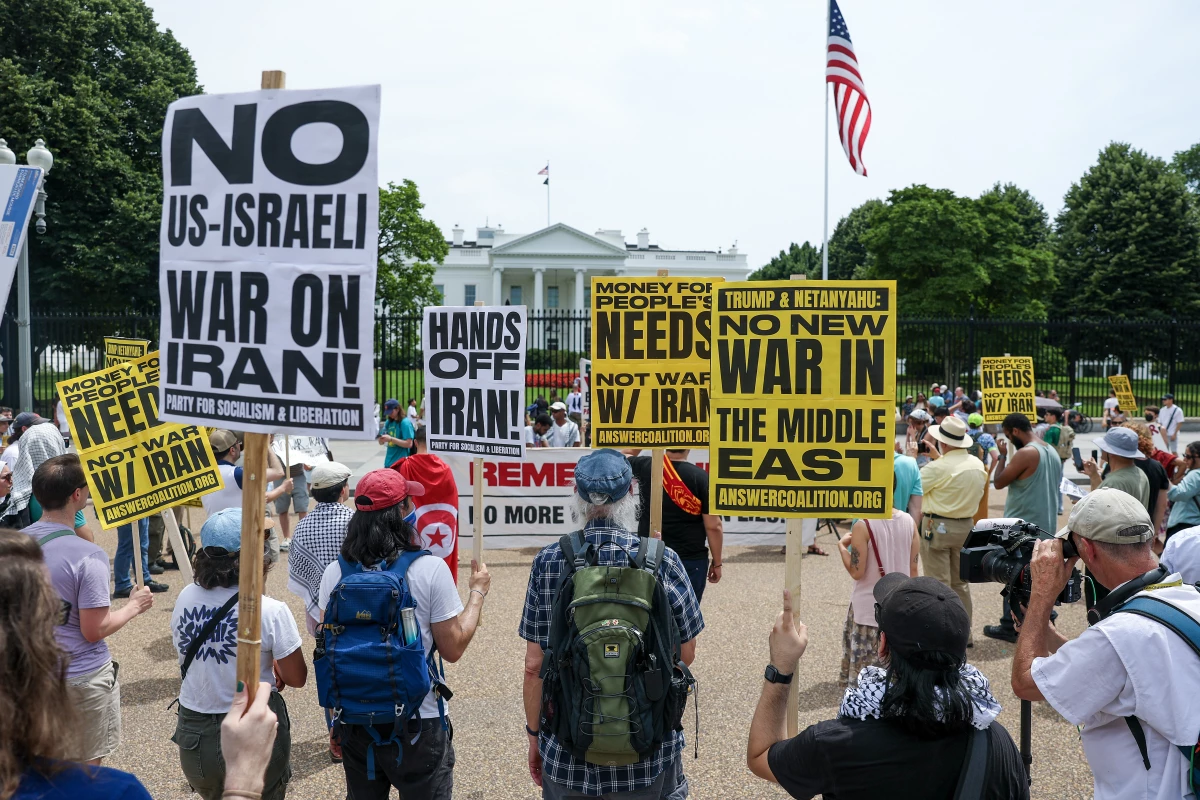 Demonstrators gather outside the White House on Sunday for a rally opposing the U.S. strikes on Iran nuclear sites.