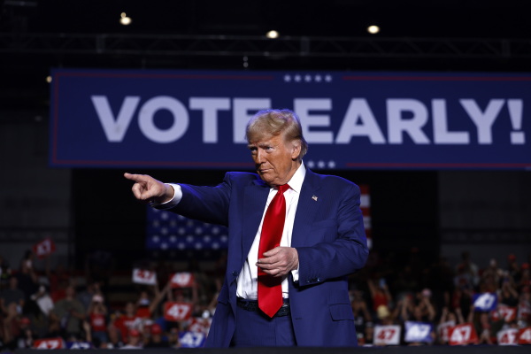 Former President Donald Trump speaks during a rally at Mullett Arena on Thursday in Tempe, Arizona. Trump travels to Texas on Friday, where he is scheduled to tape an interview with