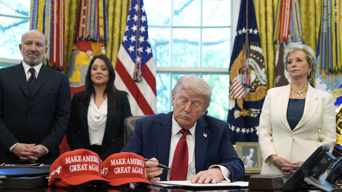 Trump signs away on education reforms with a pen mightier than logic, flanked by his loyal cabinet of innovation masterminds.