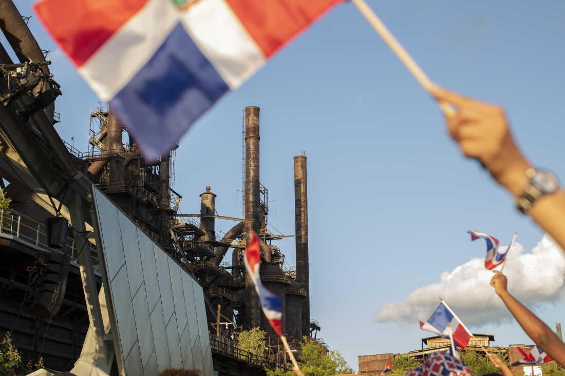Festival goers dance at the Dominican Festival, on Sept. 13, 2026 at the Levitt Pavilion at SteelStacks, in Bethlehem, Pa. Latino voters are a decisive voting bloc in Pennsylvania's highly competitive 7th Congressional District midterm race as both parties aggressively court the region's Hispanic community.