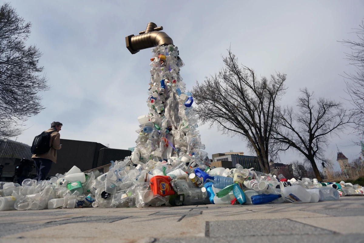 A sculpture titled Giant Plastic Tap by Canadian artist Benjamin Von Wong is displayed outside the fourth session of the U.N. Intergovernmental Negotiating Committee on Plastic Pollution in Ottawa, Canada, in April.