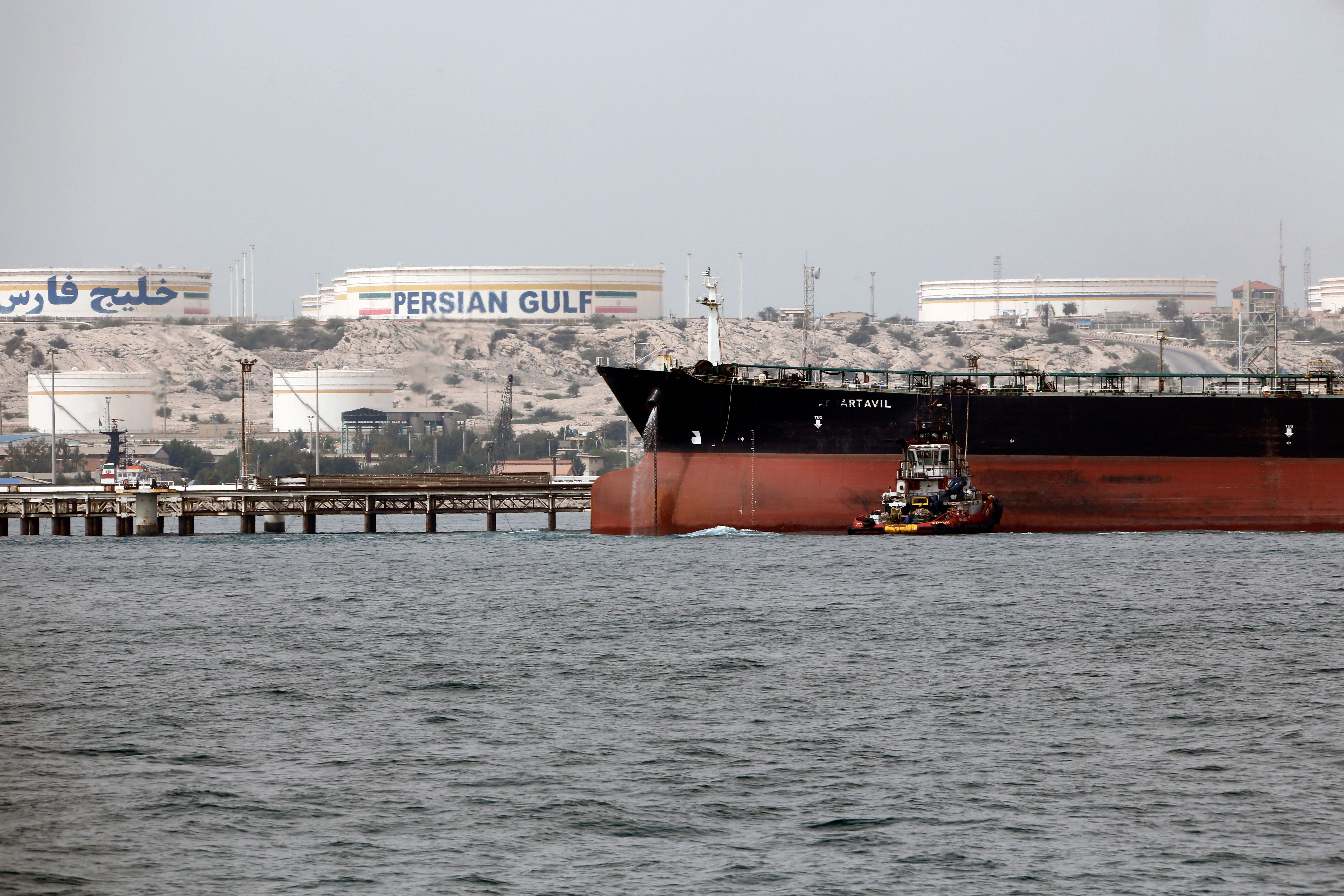 Iranian tanker docking at the platform of the oil facility in the Kharg Island, on the shore of the Persian Gulf. The island is responsible for 90% of Iran's oil exports, making it a lifeline for its economy. (AFP via Getty Images)