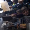 Palestinians line up for a meal in Rafah, Gaza Strip, Feb. 16.