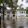 A home is surrounded by floodwater in Texas. Beryl hit the state as a Category-1 hurricane. The remnants of the storm are expected to move far from the ocean toward the Midwest, where it also poses risks of dangerous flooding.