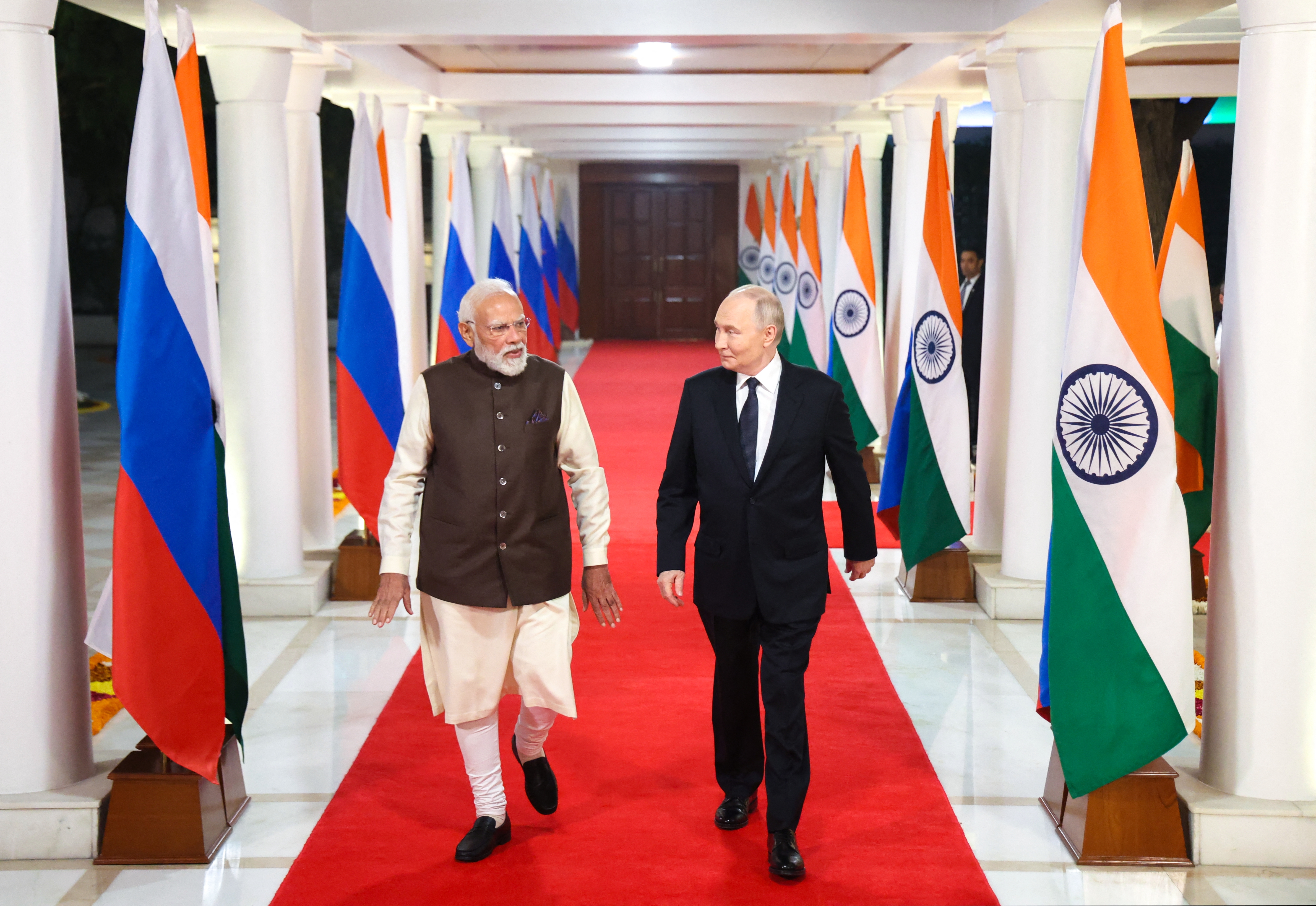 Putin and Modi expand India-Russia economic ties in talks in New Delhi Putin and Modi expand India-Russia economic ties in talks in New Delhi