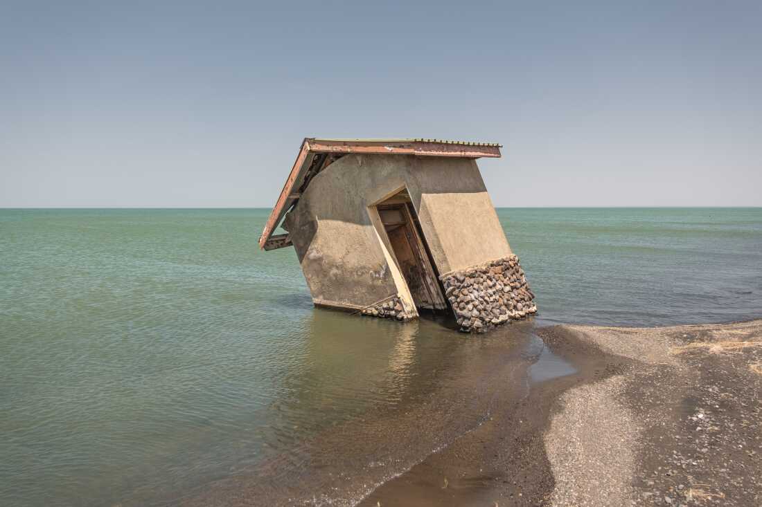 A building is seen collapsing into the waters of Lake Turkana at a ranger station on the north eastern shore of the lake. The building once stood hundreds of metres from the edge of the lake, until rising water levels encroached. Around the lake, huge tracts of land have been submerged, affecting fishermen, communities, businesses and even some of the world's most important hominid fossil sites.