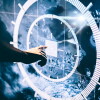 Pentagon taps Elon Musk and Palmer Luckey for strategy study : NPR 7 A hand points to a white square with a plus sign on blue-tinted map with concentric white circles.