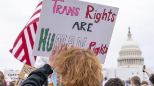 People attend a rally as part of a Transgender Day of Visibility on March 31, 2023, by the U.S. Capitol in Washington.