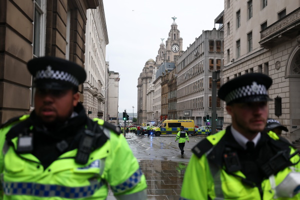 A large emergency service presence is pictured in Liverpool, England, on Monday, after a car drove into pedestrians during a parade.