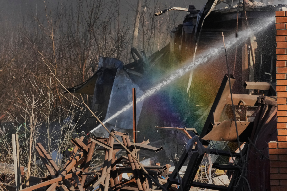 Firefighters put out the fire at railway workshops following a Russia missile and drone attack, in Brovary close to Kyiv, Ukraine, on Saturday.