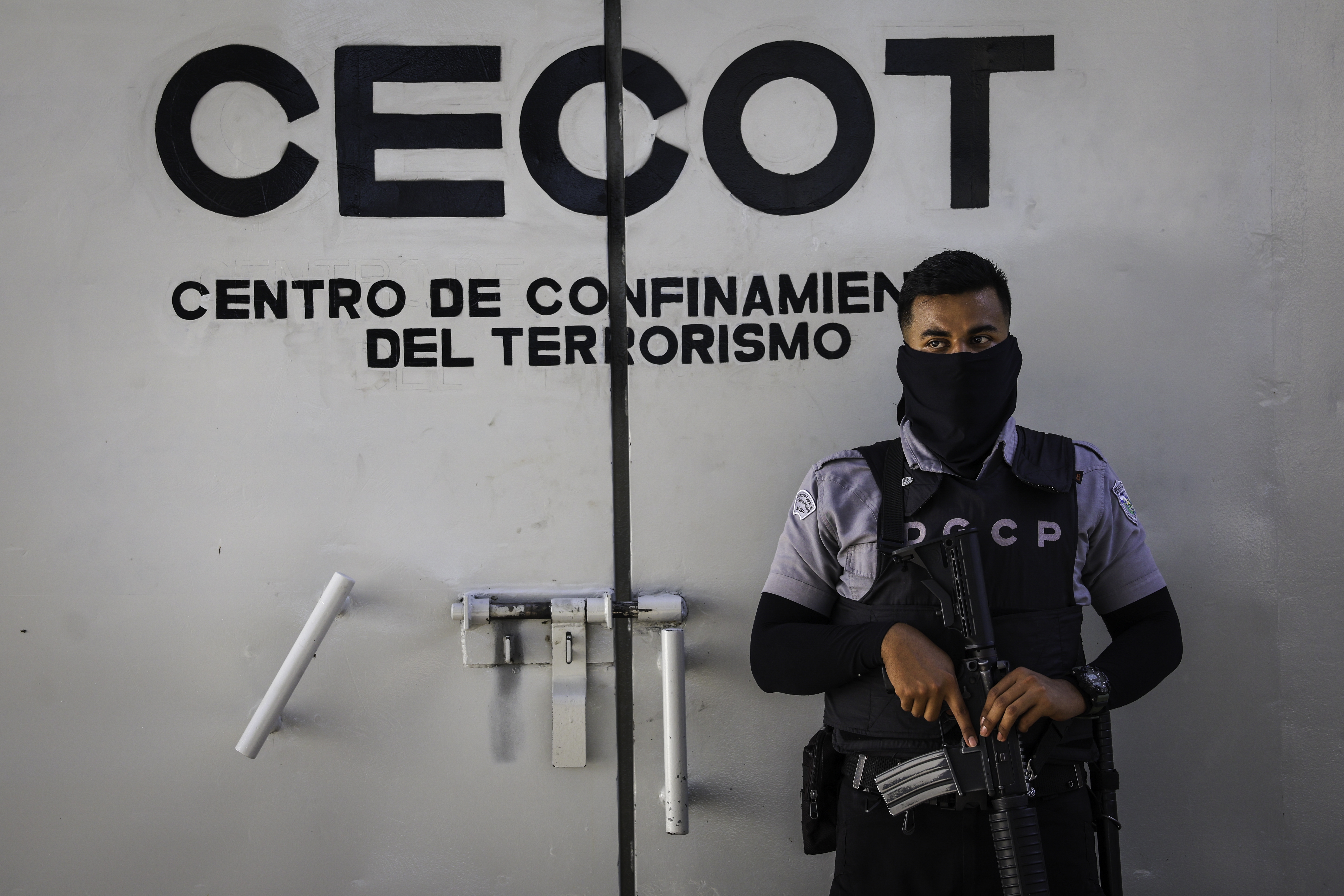 A prison guard mans an interior perimeter at the CECOT (Counter Terrorism Confinement Center) on Dec.15, 2025 in Tecoluca, El Salvador. CECOT gained notoriety in 2025 when the Trump administration began its controversial policy of deporting people to El Salvador who they claimed were members of the Venezuelan gang Tren De Aragua.