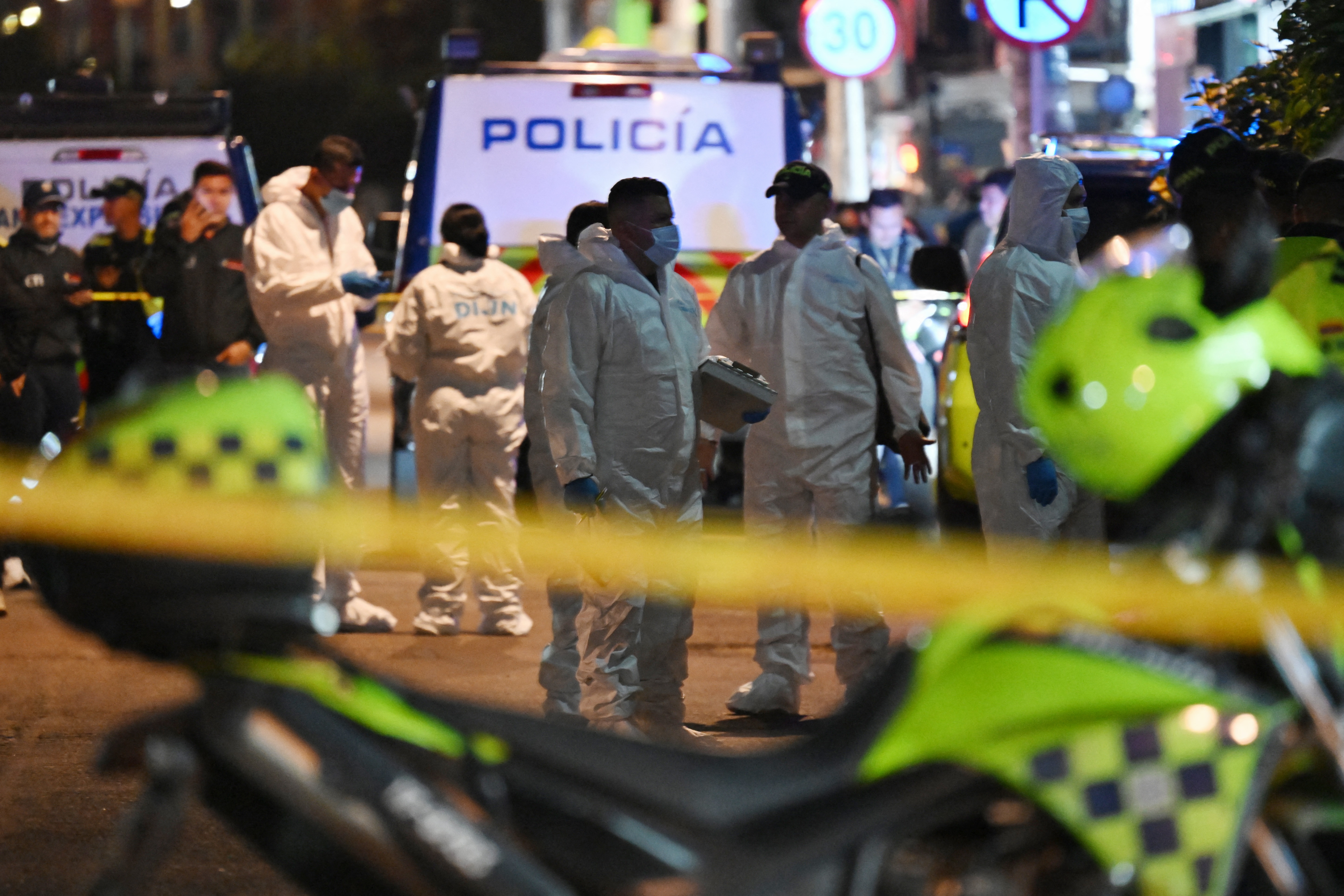 Forensic experts work at the crime scene where Senator Miguel Uribe Turbay was shot and wounded in the Modelia neighborhood in Bogota on June 7, 2025.