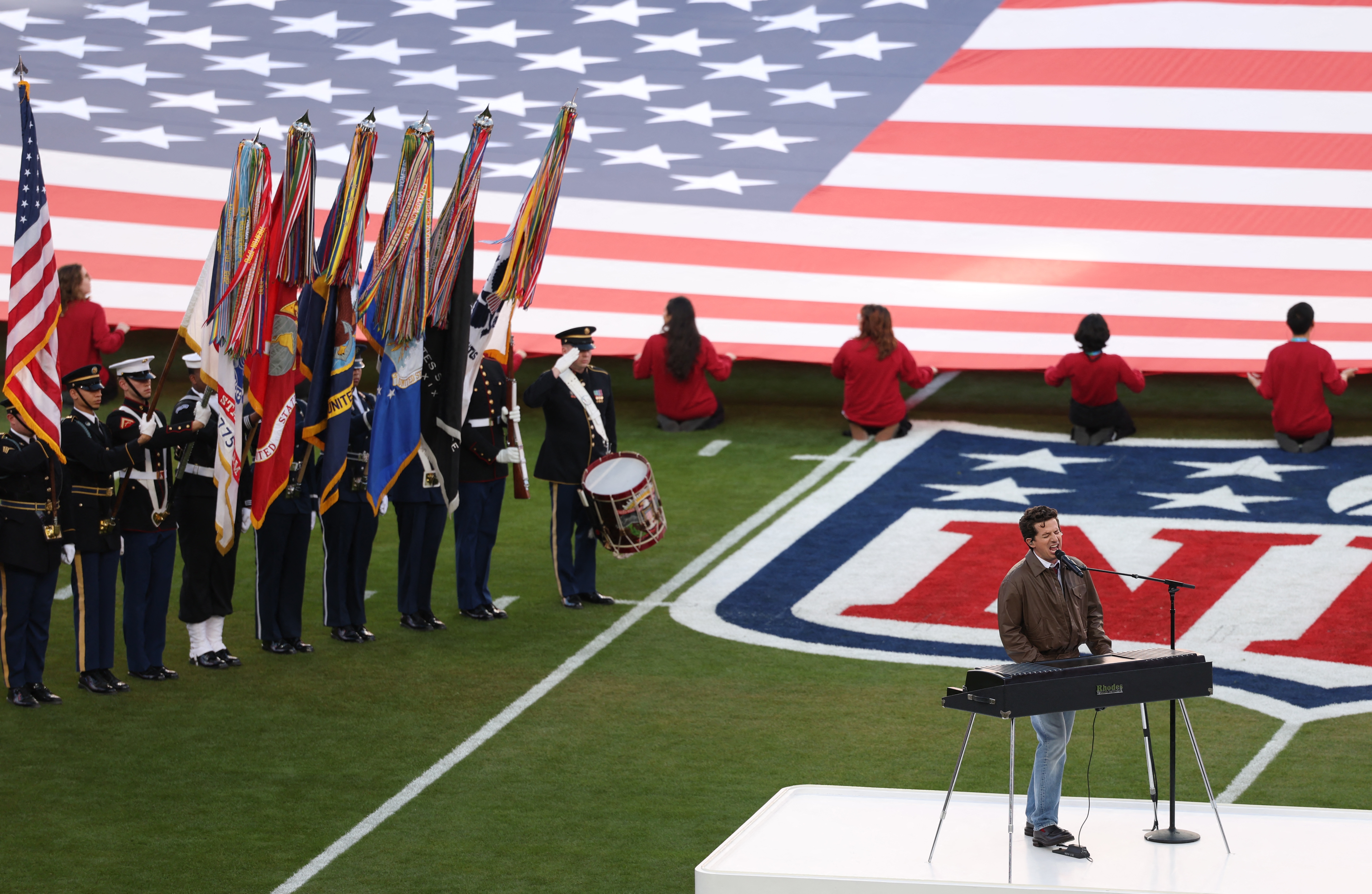 Singer Charlie Puth performs the national anthem ahead of this year