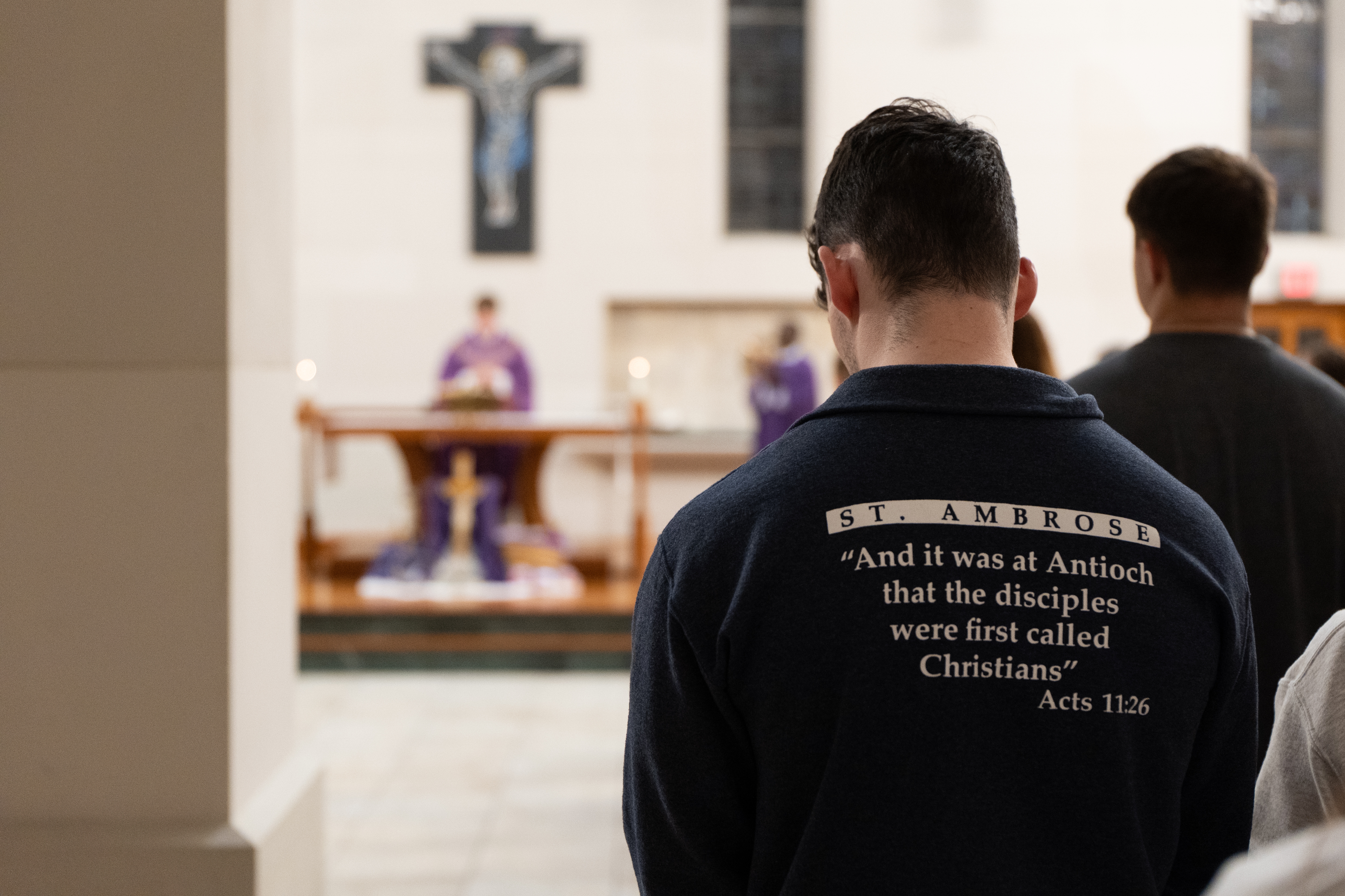 Wednesday night Mass at St. Ambrose University attracts a congregation of mostly students. On one recent evening, they added a prayer for the university