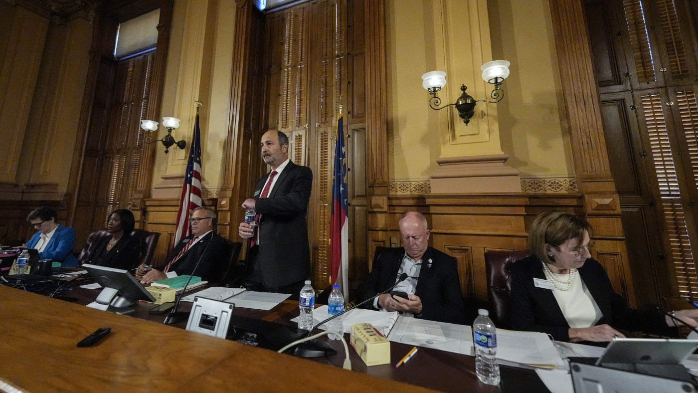 Georgia’s election board OKs controversial new voting rule : NPR
