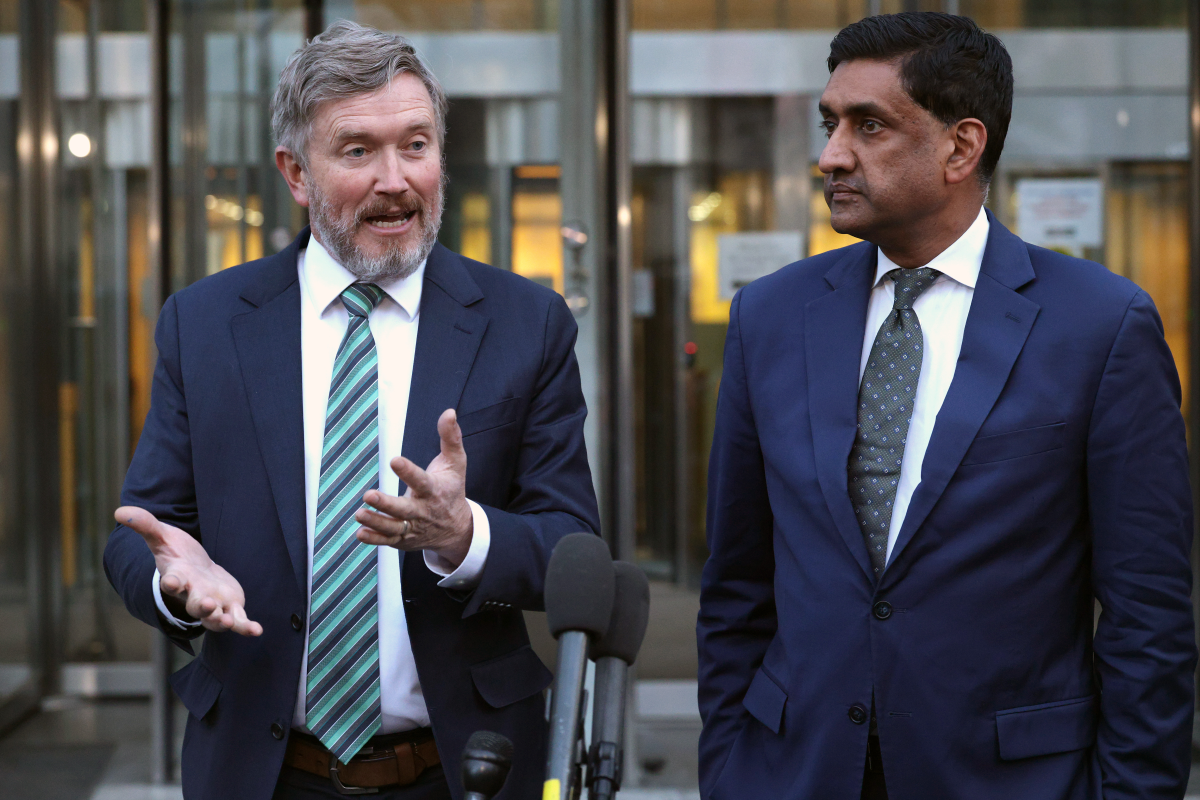 Rep. Thomas Massie (left) and Rep. Ro Khanna, seen outside the Justice Department on Feb. 9, have been leading a push in the House for a war powers vote.