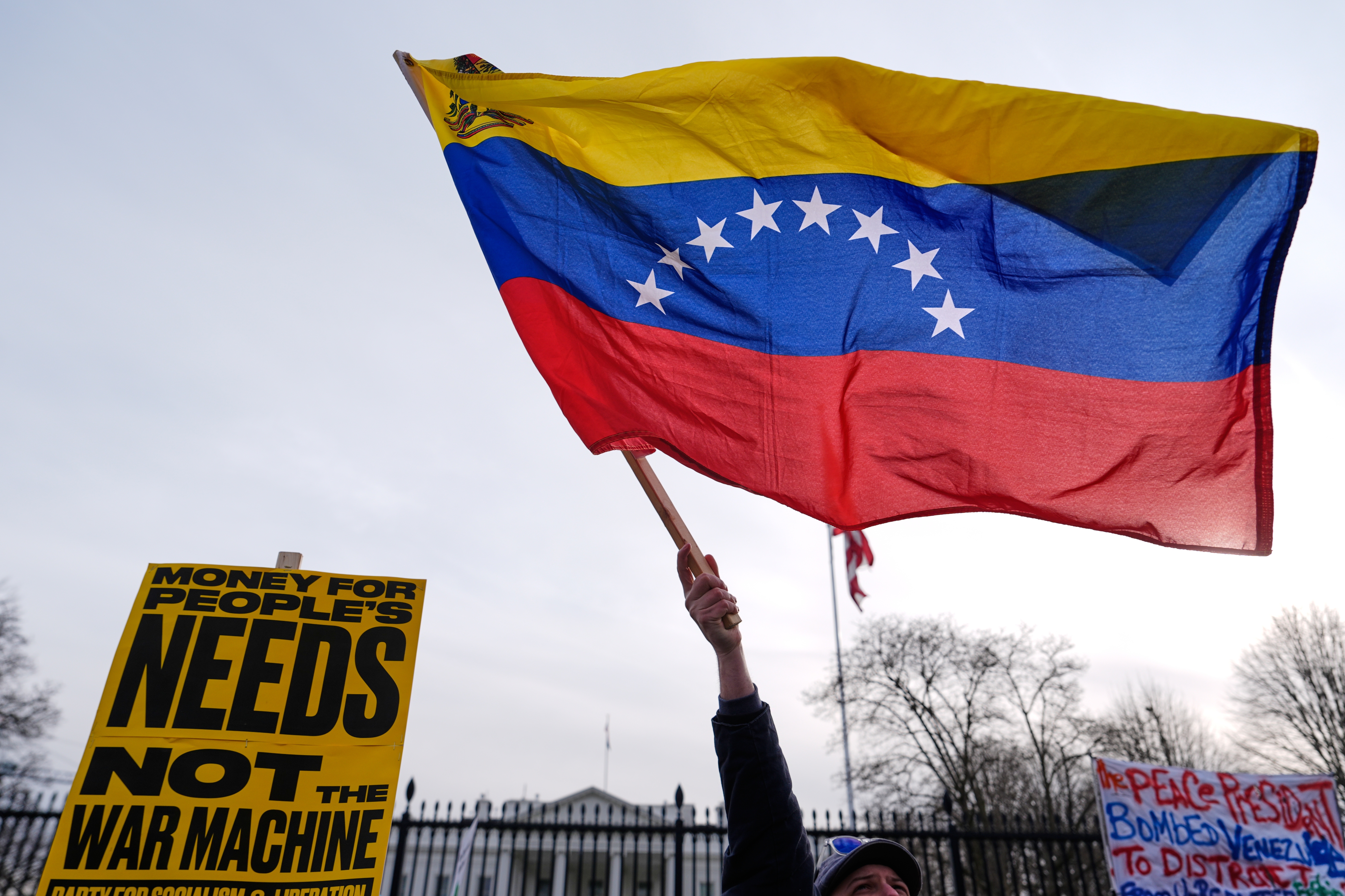 Protesters rally outside the White House Saturday, Jan. 3, 2026, in Washington, after the U.S. captured Venezuelan President Nicolás Maduro and his wife in a military operation.