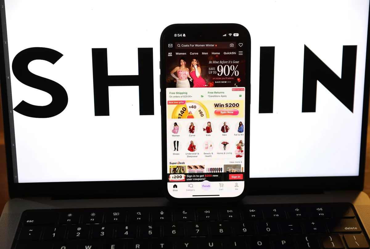 President Trump has ended the de minimis duty-free exception for China, as part of his imposition of tariffs. The app for Shein, the Chinese-founded discount online retailer, is seen here on a smartphone.