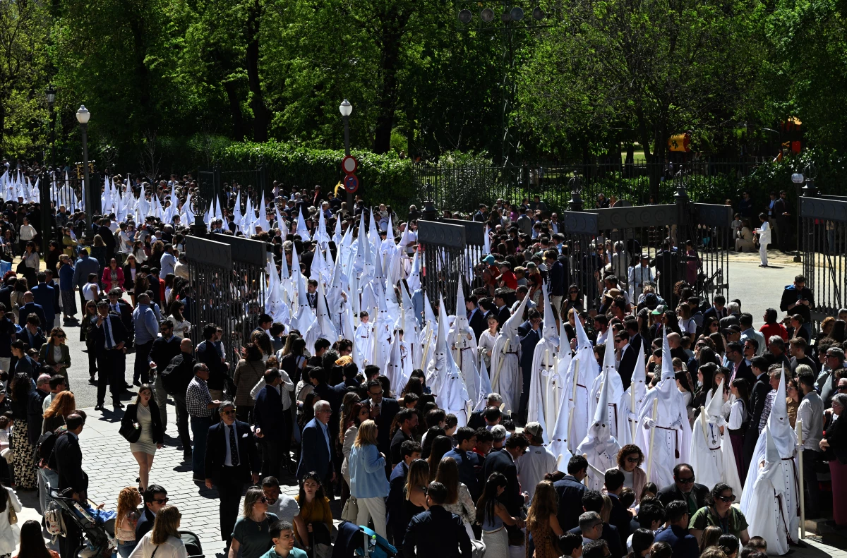 Penitents from the La Paz brotherhood parade in the Palm Sunday procession in Seville on March 29.