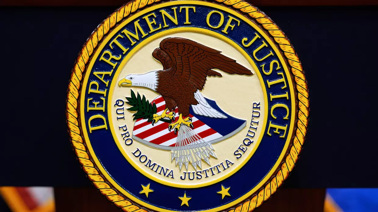 The U.S. Department of Justice logo is seen on a podium before a news conference at the Justice Department in Washington, on May 6, 2025.