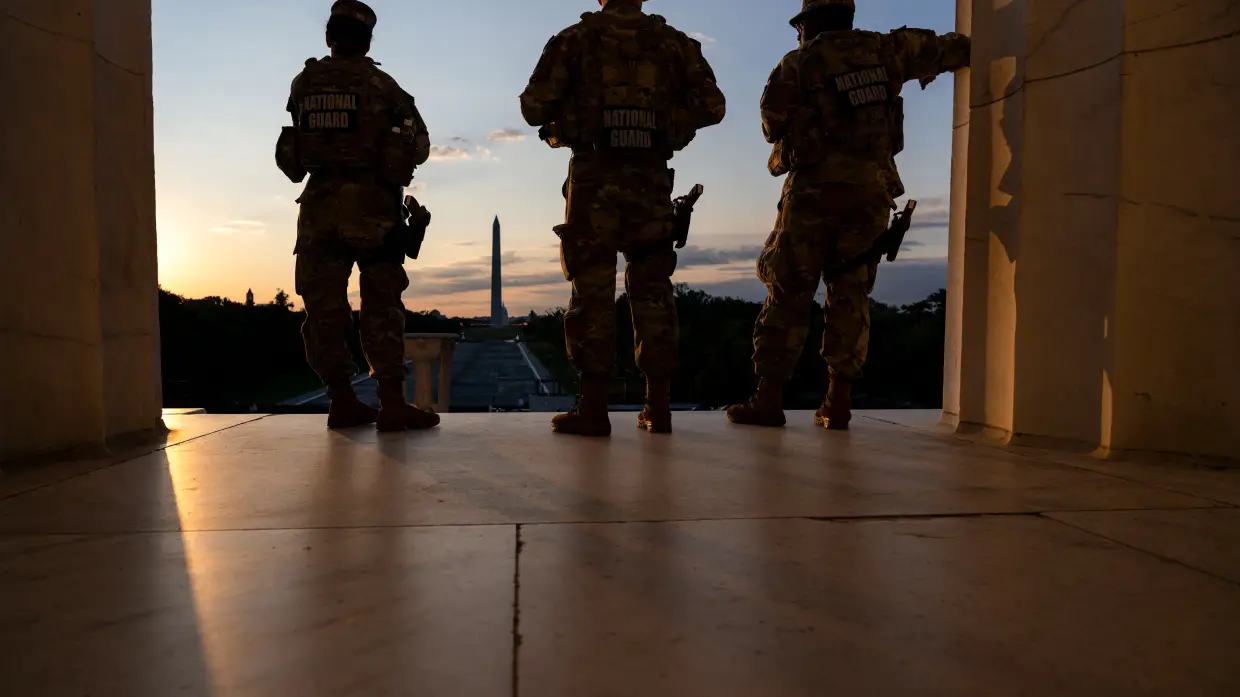 Armed troops have patrolled D.C. for 1 year now. It's challenging democratic norms