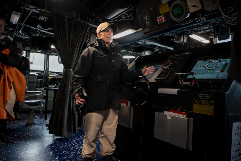 Capt. Mary Katey Hays, commanding officer of USS Ted Stevens, shows the vessel's pilot house, or bridge.