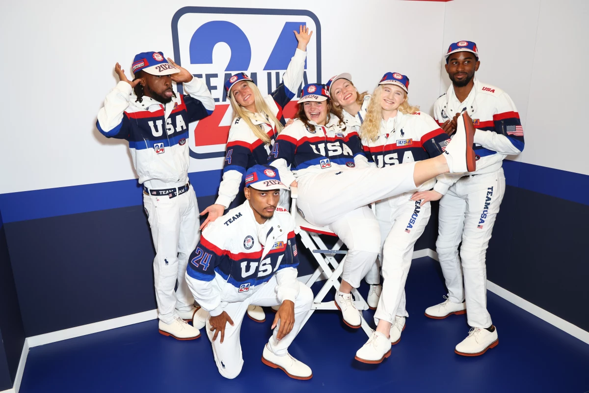 U.S. Paralympians Isaac Jean-Paul, Erin Kerkhoff, Jaydin Blackwell, Noelle Malkamaki, Jessica Heims, Liza Corso and Jonathan Gore pose in Paris on Saturday.