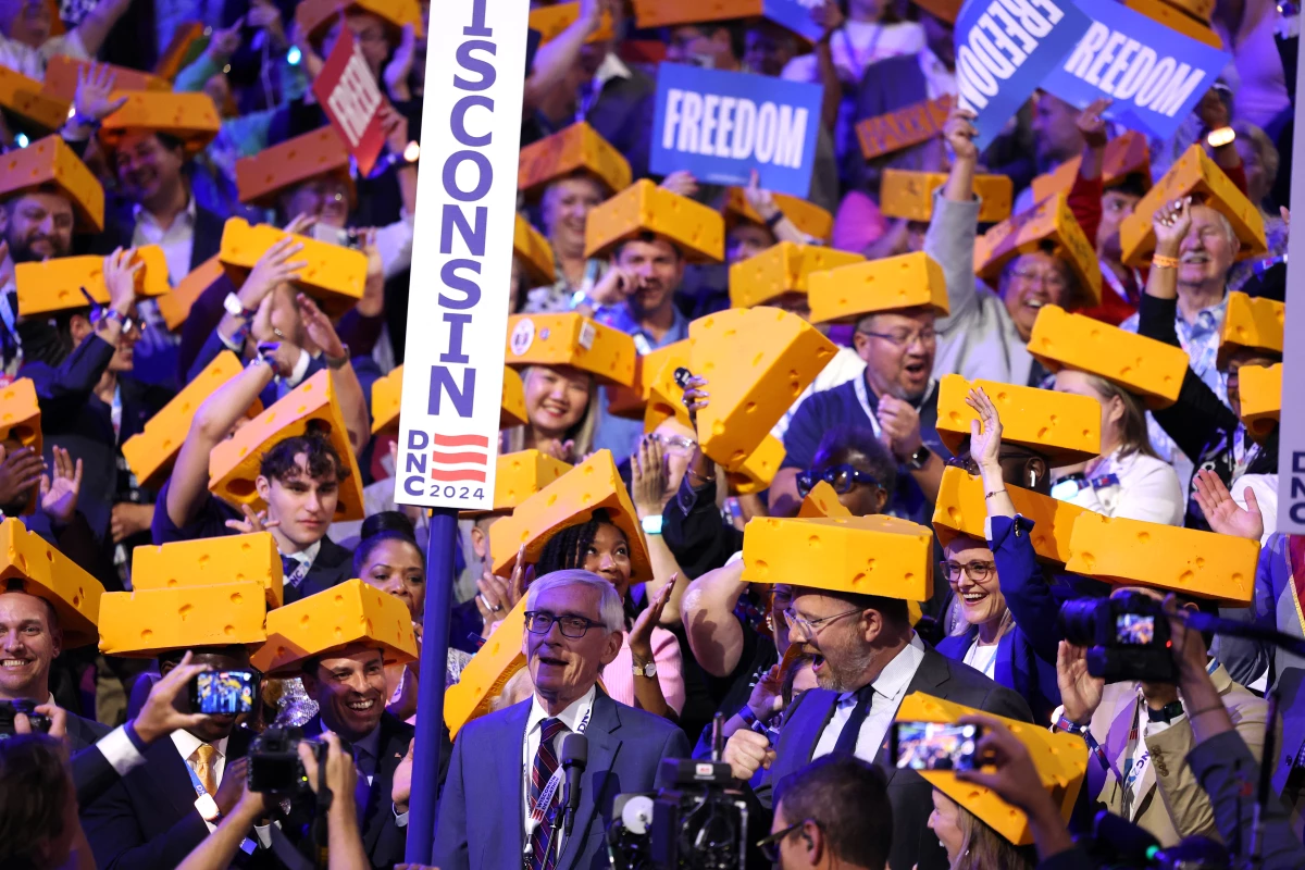 Wisconsin delegates cast their vote during the ceremonial roll call vote on the second day of the Democratic National Convention in Chicago, Illinois, on August 20, 2024.