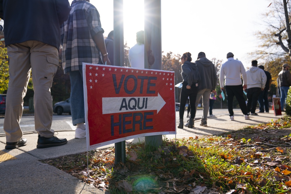 Voters line up outside of an early voting location for the 2022 midterm election in Woodbridge, Va. (Getty Images)