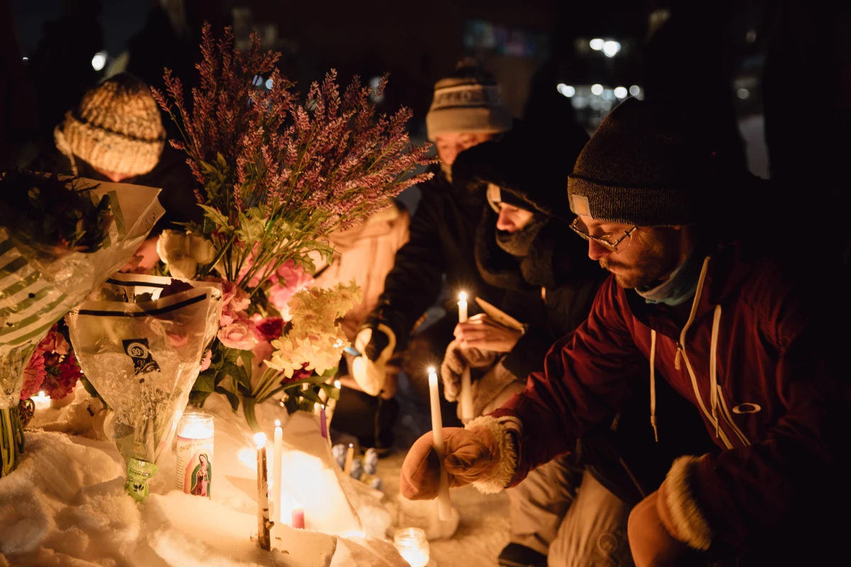 People gather Saturday during a vigil for 37-year-old Alex Pretti, who was fatally shot by a federal Border Patrol agent earlier in the day during an immigration enforcement operation in Minneapolis.