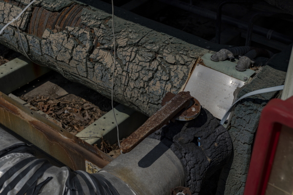 A large AC unit at Trinity Woods, originally installed in 1993, shows severe rust damage. The unit has since been replaced, but aging infrastructure remains a concern at the subsidized senior living center in Emporia, Va., on Friday, Feb. 28, 2025. Photographer: Carlos Bernate for NPR.